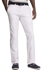 Man wearing white chinos with black belt and casual sneakers